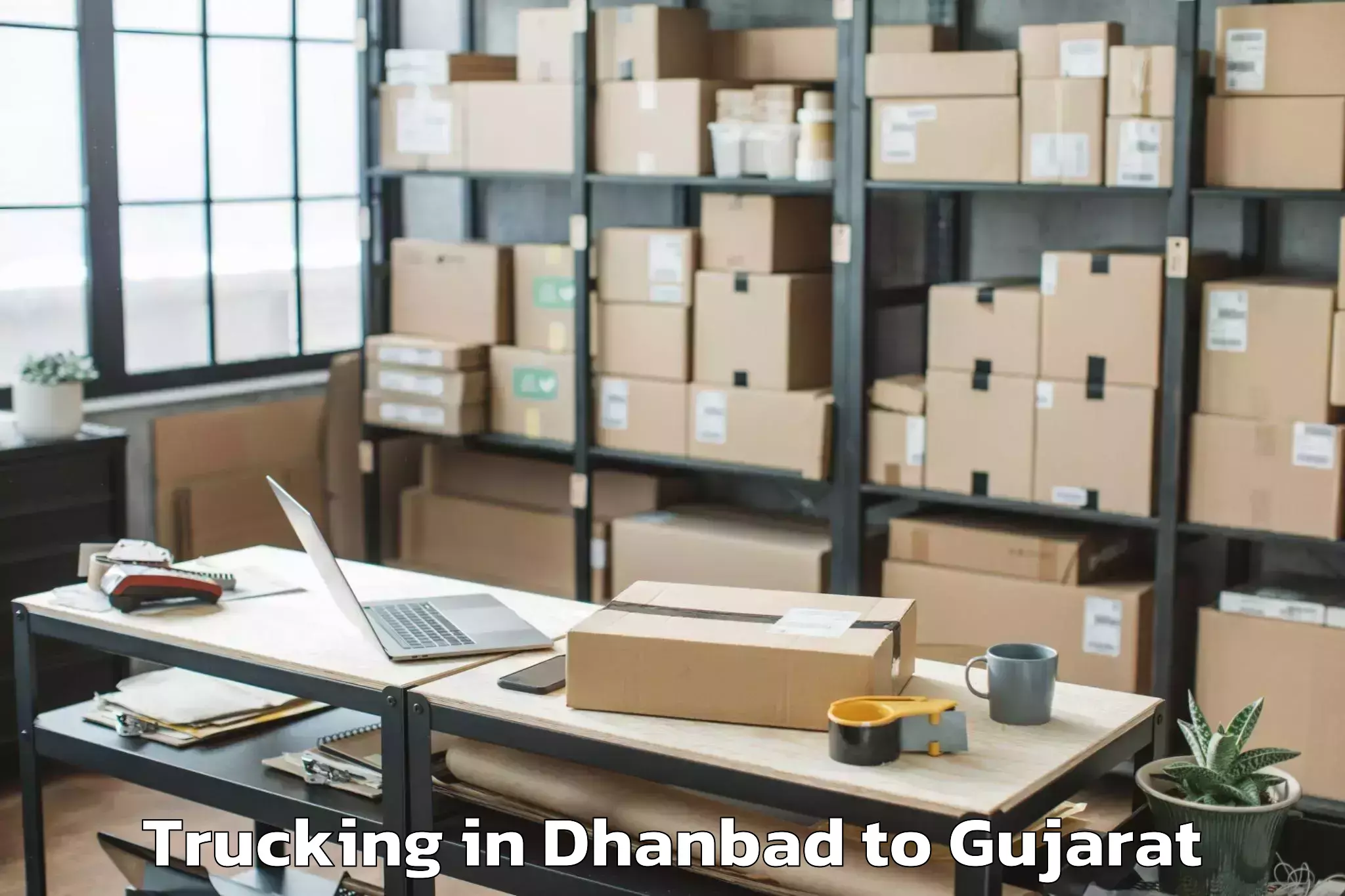 Easy Dhanbad to Porbandar Trucking Booking